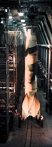 V–2 rocket standing upright in underground factory, photograph by Walter Frentz. Courtesy of Hanns-Peter Frentz/Amicale des déportés de Dora-Ellrich.