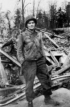 Pfc. John Rison Jones 
amid the destruction of the war. Courtesy of UAHuntsville Salmon 
Library.